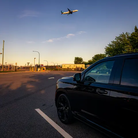 Golden-hour pickup as a jet departs overhead